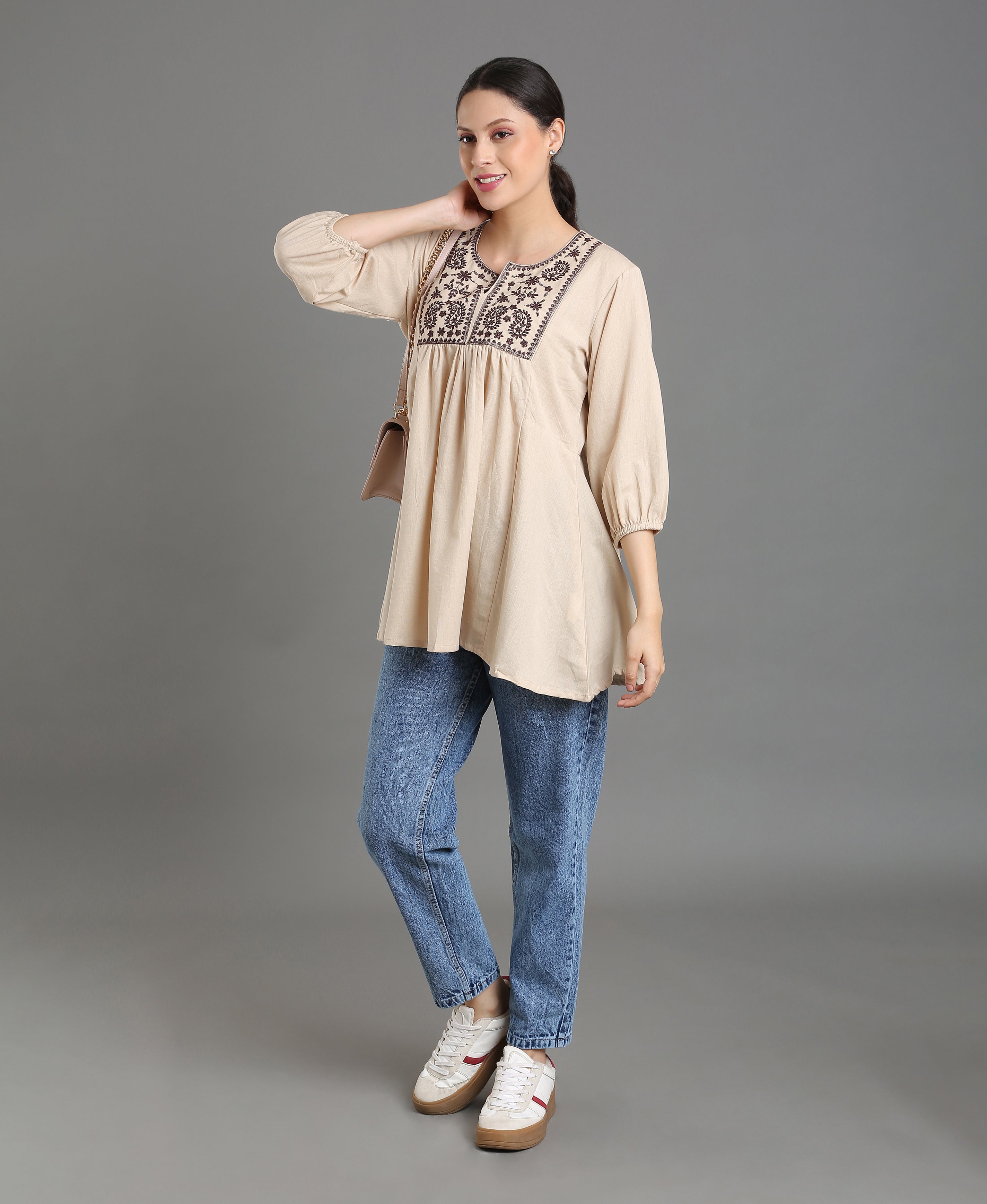 Cream Embroidered Peplum Top